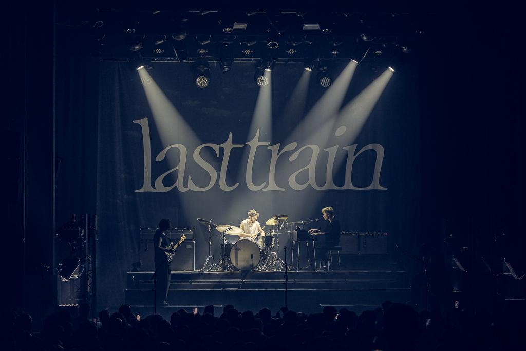 <a href='/artists/last-train/'>Last Train</a>